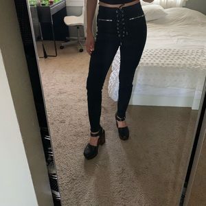 Black skinny jeans with tie up front.